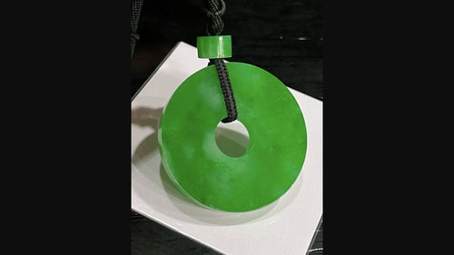 Green jadeite circle pendant